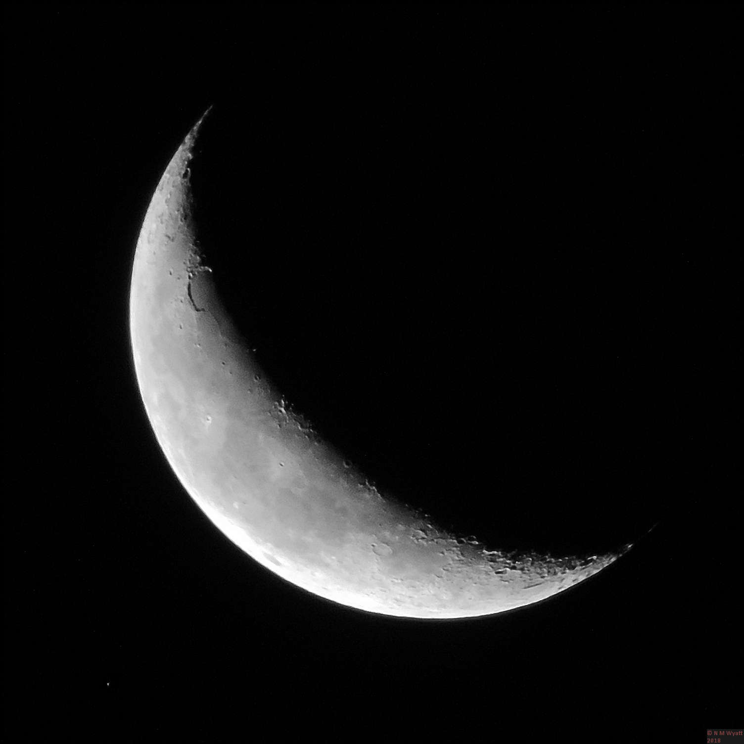 The moon, soon to occult the star Delta Gemini